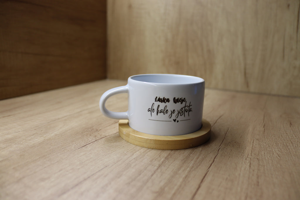 Hrnek "Láska hřeje, ale kafe je jistota."